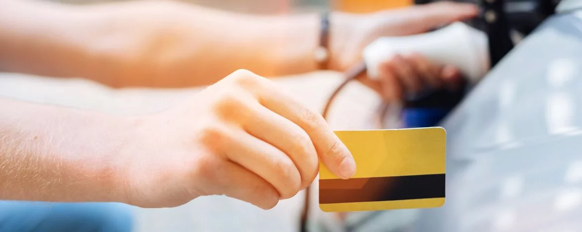 EV car being charged with a charge card