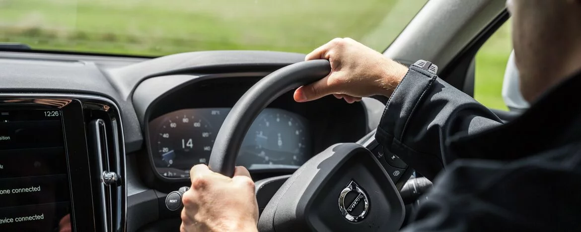 Man driving Volvo XC40